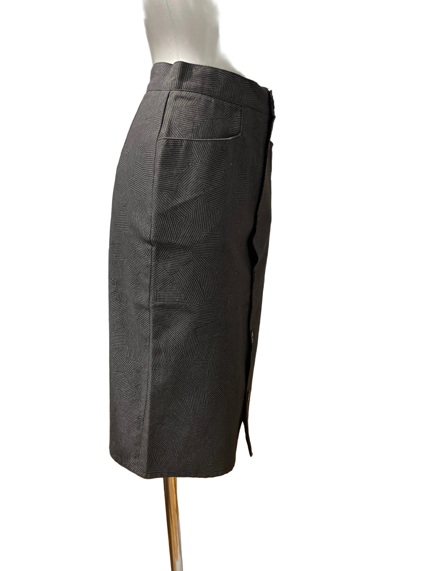 ♻️Vintage pannalskjørt i gråspraglet farge- knapper hele veien i front. Ca str 36- tilstand: Veldig god – ingen hull, flekker eller synlig slitasje